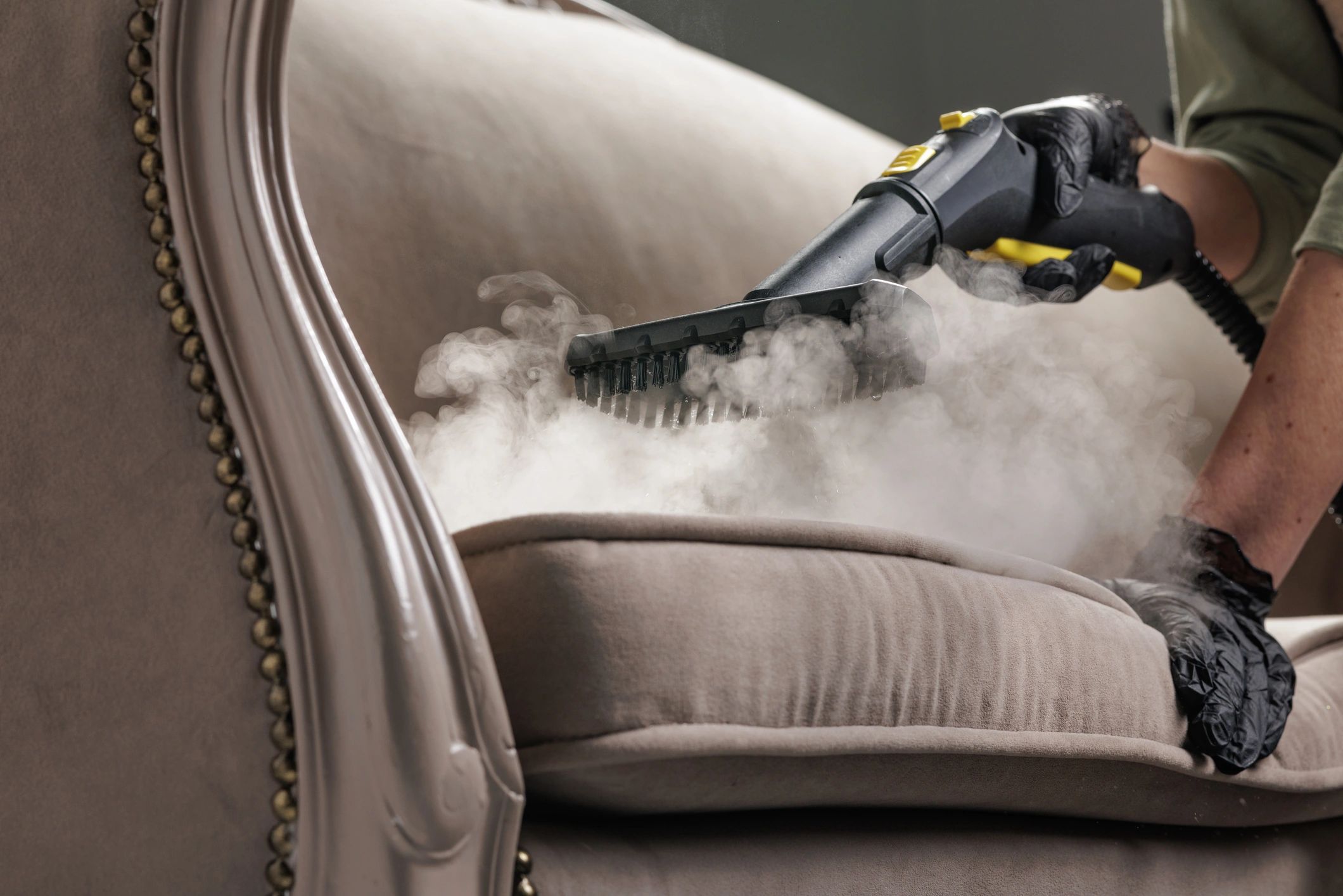 Deep cleaning upholstery with steam equipment