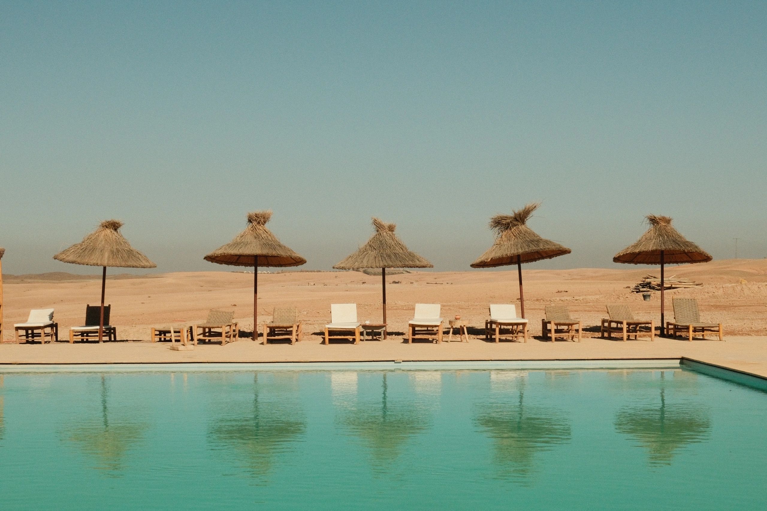 Clean outdoor swimming pool maintained for guests